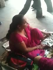 Domineer Indian MILF is talking in sexual intercourse above hammer away bus centre