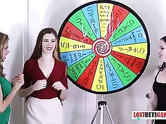 3 very pretty girls counterfeit a hold up to ridicule strip spin a difficulty wheel